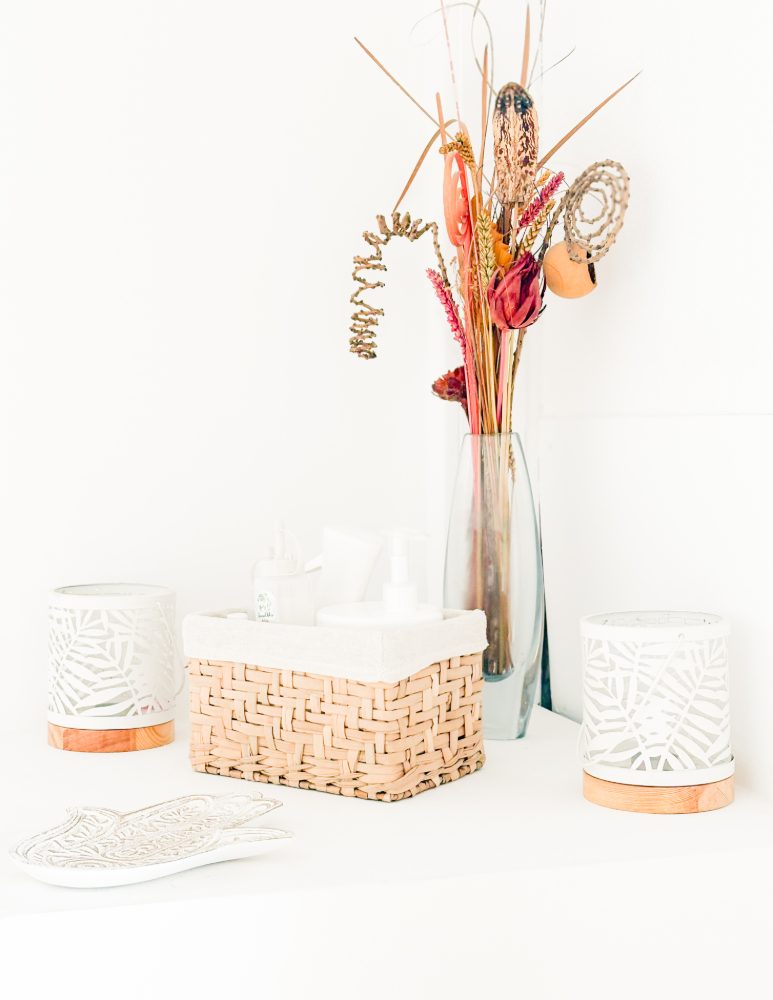Organic oils and fresh linens set out in the studio